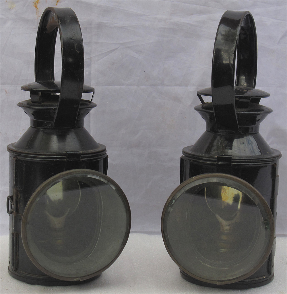 2 x London Transport railway hand lamps. Both complete and embossed LT on one side.