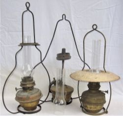 A lot containing 2 x brass signal box hanging lamps complete with glass chimneys and cradles. One