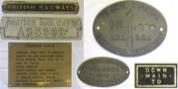 A collection of railway plates to include brass loco towing sign, LMS TRACK CIRCUIT plate, HURST