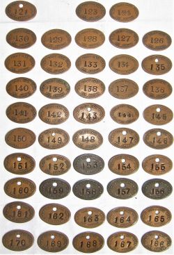 A collection of 48 GWR oval LOCO DEPT pay checks numbered 121 to 166 with missing numbers. Recovered