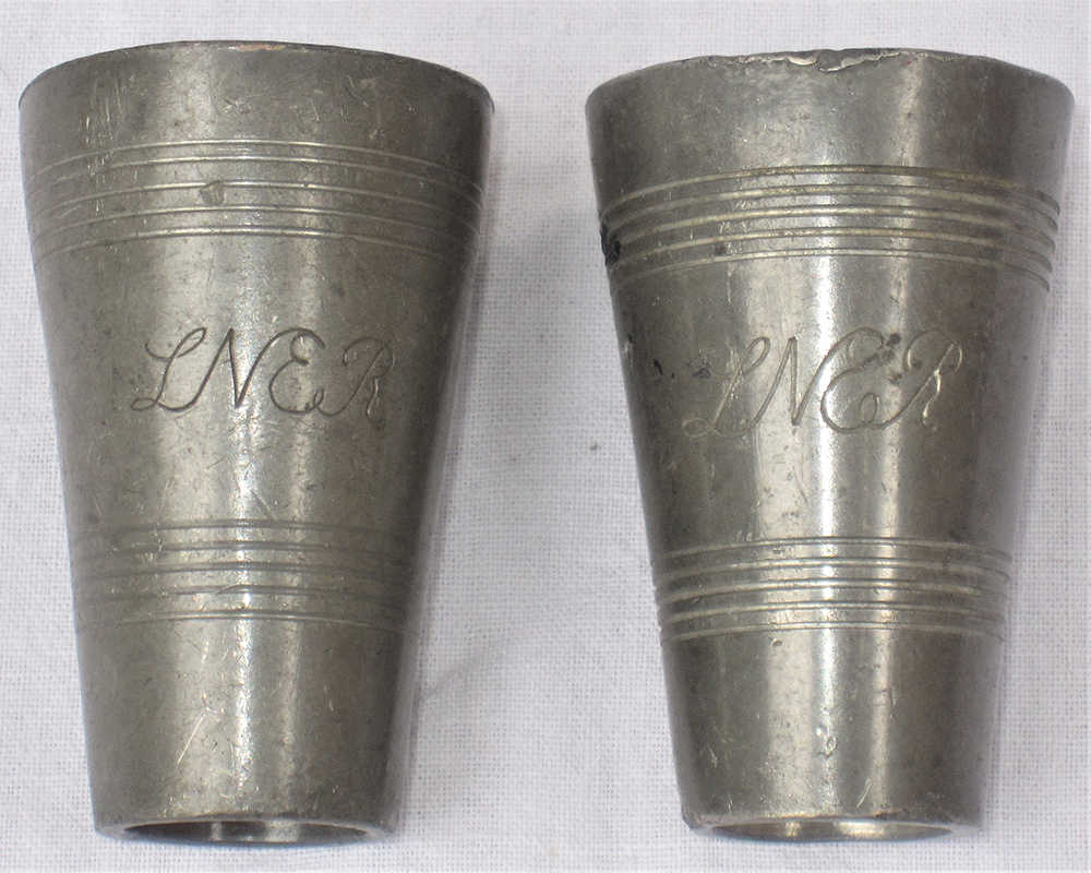 2 x LNER SPIRIT TOTS engraved on front LNER in scroll lettering.