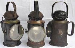 3 x brass collar hand lamps. 1 x GWR Bladon 1938 with rusted skirt and 2 x BR(W) 3 and 4 aspect hand