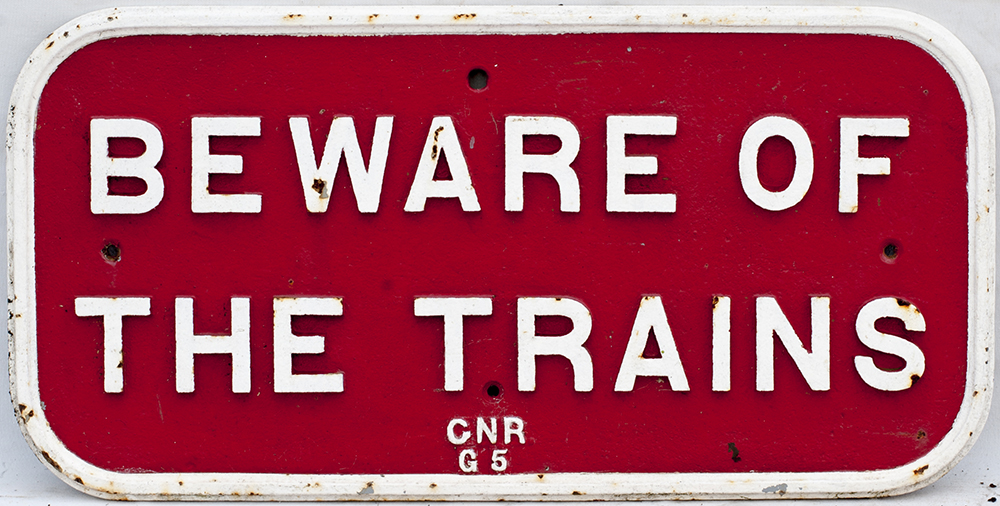 GNR cast iron BEWARE OF TRAINS Notice. In good original condition.