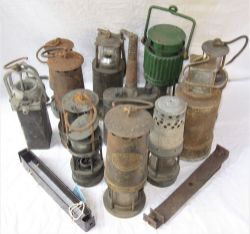 A Lot containing approximately 10 x complete and incomplete miners safety lamps together with a