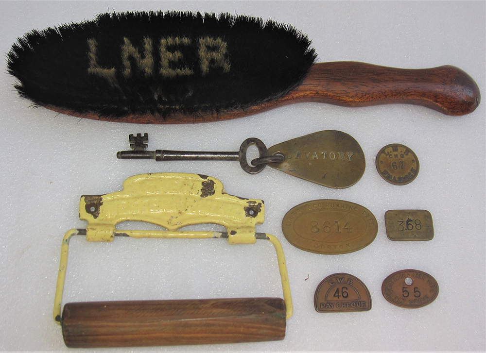 A sundry Lot consisting of an LNER Clothes brush. A Great Western Railway Toilet holder. A