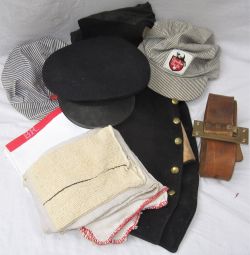 A lot containing various railway caps, cloths and a waist coat fitted with 5 x LNER buttons.