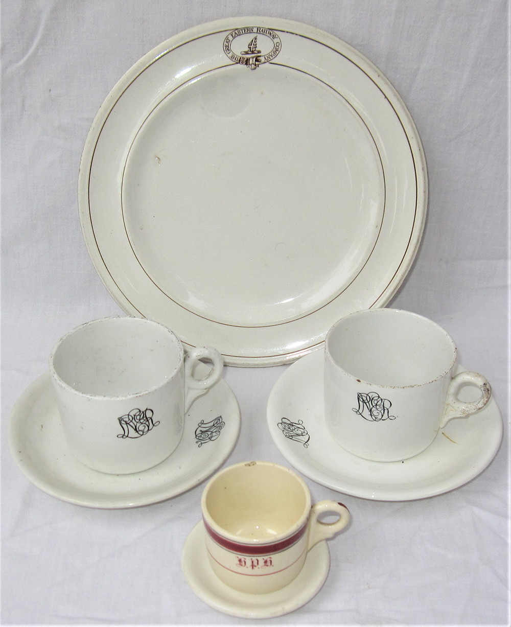 A collection of GER and LNER tableware to include 2 x LNER matching cup and saucer. 1 x GER dinner