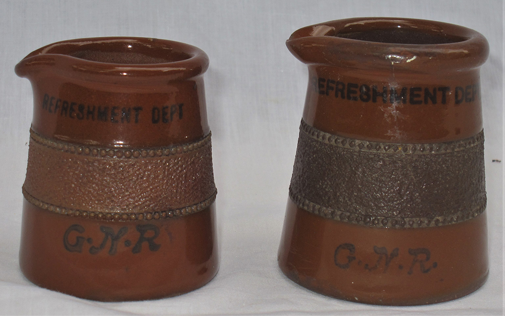 2 x GNR Cream tots or jugs. Both marked GNR REFRESHMENT DEPT. Both in excellent condition.