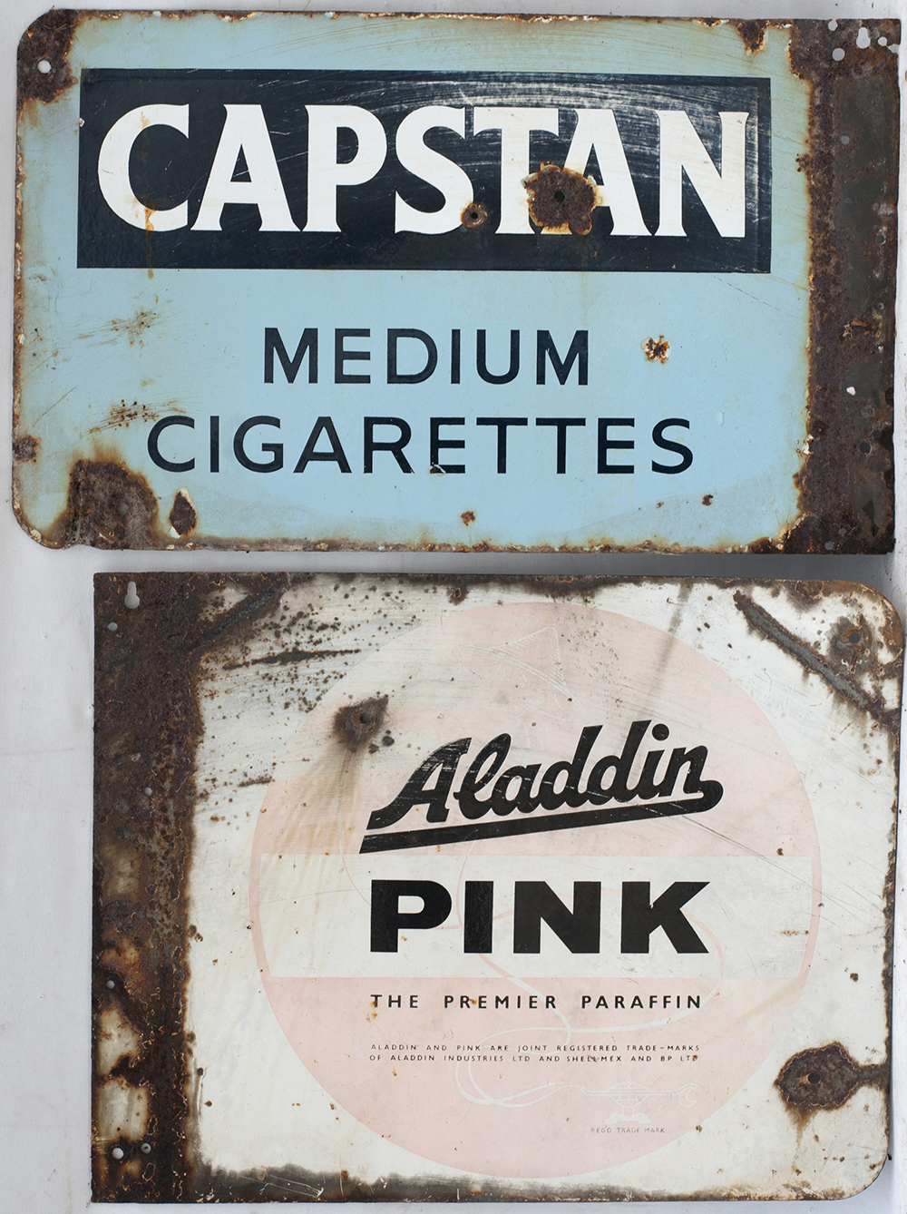 2 X Enamel double sided Advertising Signs. CAPSTAN MEDIUM CIGARRETTES and ALADDIN PINK PARAFIN.