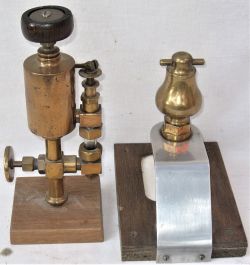 2 x brass locomotive items. Brass lubricator assembly together with a brass accumulator both mounted