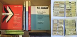 A box containing over 20 British Rail timetables from the 1960s, 1970s and 1980s together with a