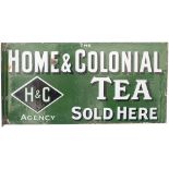 Advertising enamel sign THE HOME & COLONIAL TEA SOLD HERE H&C AGENCY. Double sided with wall