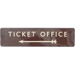 BR(W) FF enamel station sign TICKET OFFICE with left facing arrow. In good condition with a few