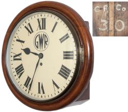 Cardiff Railway 12in oak cased chain driven fusee railway clock. The oak case with eight piece