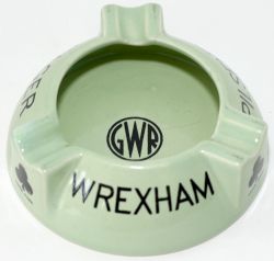 GWR china Ashtray marked with the GWR roundel in the centre and WREXHAM PILSENER LAGER. Base is