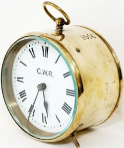 GWR brass Drum Clock with original enamel dial lettered G.W.R. and stamped 5556 on the side and back