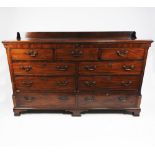 A George III mahogany and inlaid Lancashire mule chest, circa 1780