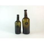 Two wine bottles with the Bagot family crest