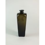 An 18th century green glass gin bottle