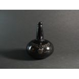A 19th century engraved onion wine bottle