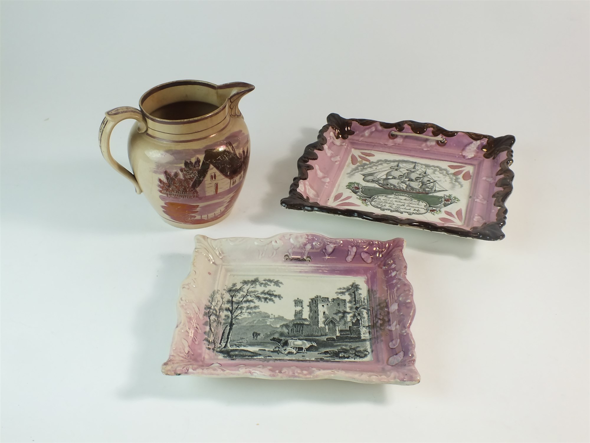 Two pink splashed lustre plaques and a jug