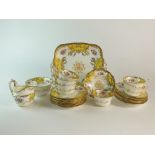 A Coalport yellow batwing tea service