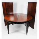 A Joseph Fitter patent action extending mahogany dining table