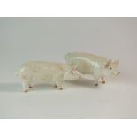 A pair of Beswick pigs