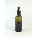 A cylindrical wine bottle with seal for David Pugh, Welshpool