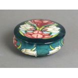A Moorcroft limited edition powder jar and cover