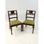 A set of five late Regency mahogany dining chairs