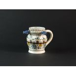 A 19th century pearlware puzzle jug