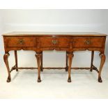 A Queen Anne style burr ash dresser base