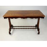 A Victorian quarter veneered walnut side table