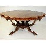 A Victorian figured walnut centre table circa 1860
