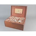 A Victorian mahogany cased geological specimen set by Thomas D. Russell