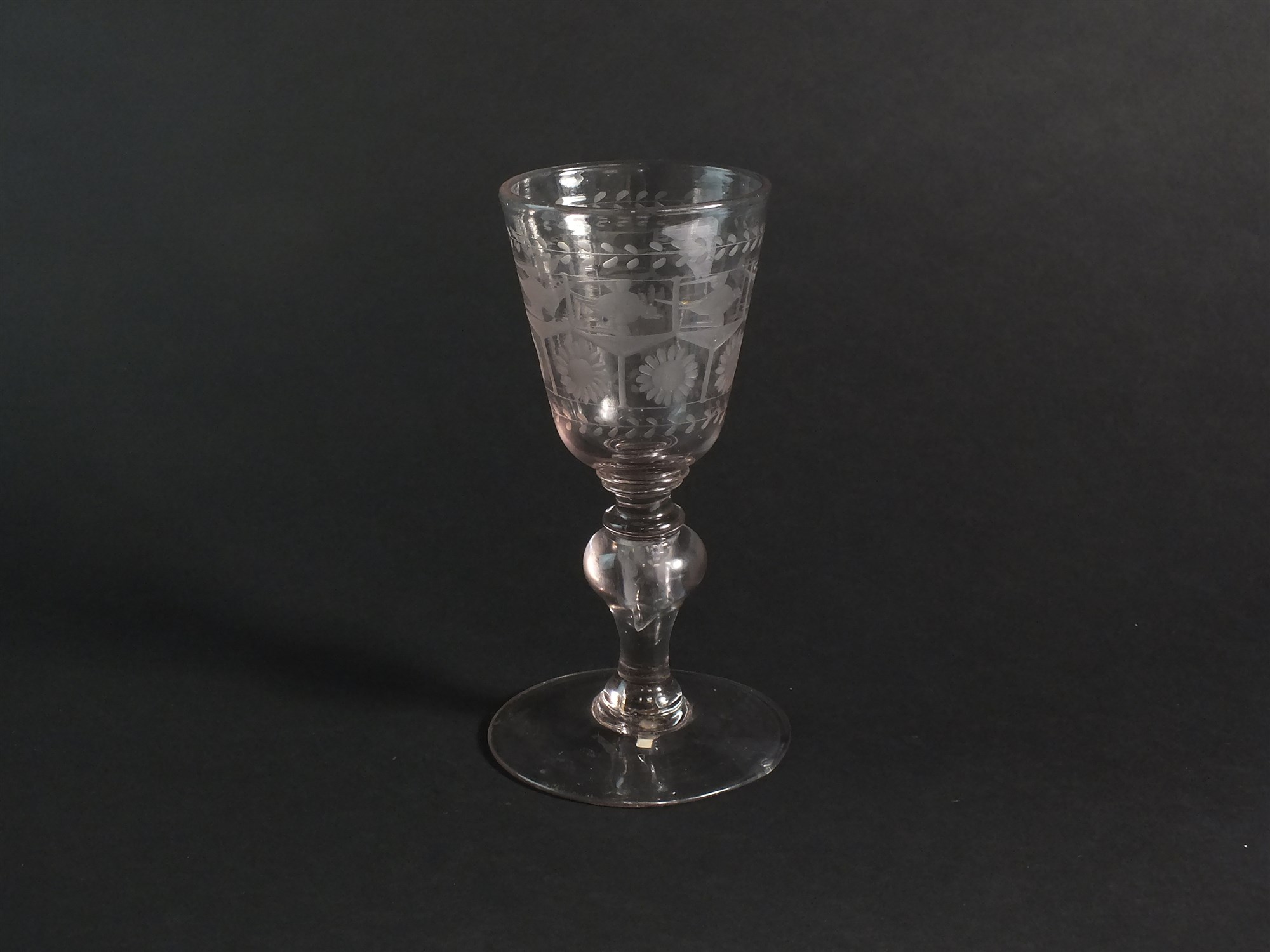 An early 19th century goblet with baluster knop stem