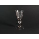 An early 19th century goblet with baluster knop stem