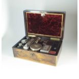 A cased silver mounted travelling vanity set