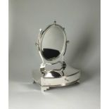An Edwardian silver dressing table mirror