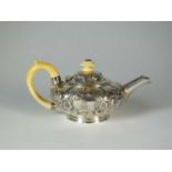 A Victorian silver miniature teapot