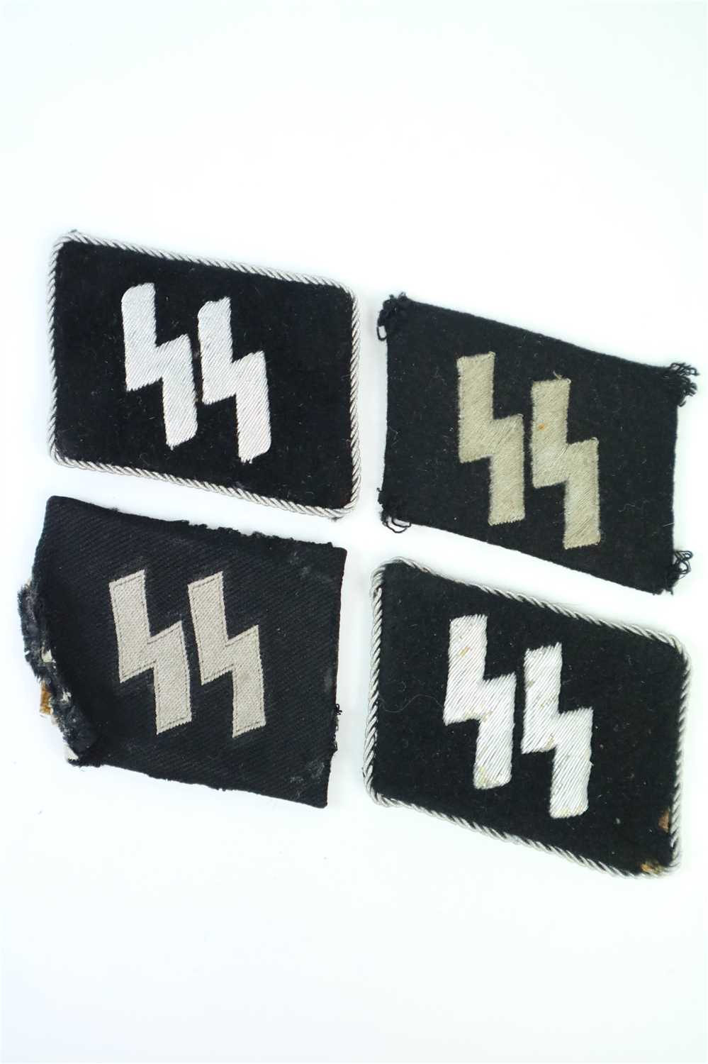 Four German Third Reich Waffen SS ‘Runic’ collar tabs in wool and cotton (4)