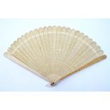 A Canton carved ivory brise fan
