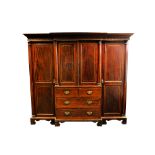 A Victorian boxwood and ebony strung break front triple wardrobe