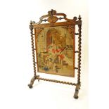 A Victorian walnut framed fire screen