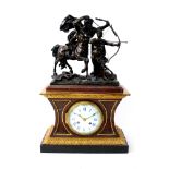 A French rouge griotte, bronze and gilt metal mounted mantel clock