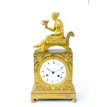 A French Empire gilt bronze mantel clock