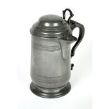 An early 19th century dome lidded pewter quart measure