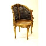 A French giltwood Bergère tub chair c1900