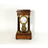 A French rosewood and inlaid portico clock